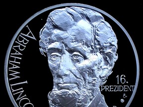 Stříbrná pamětní mince Abraham Lincoln (J. Dostál)